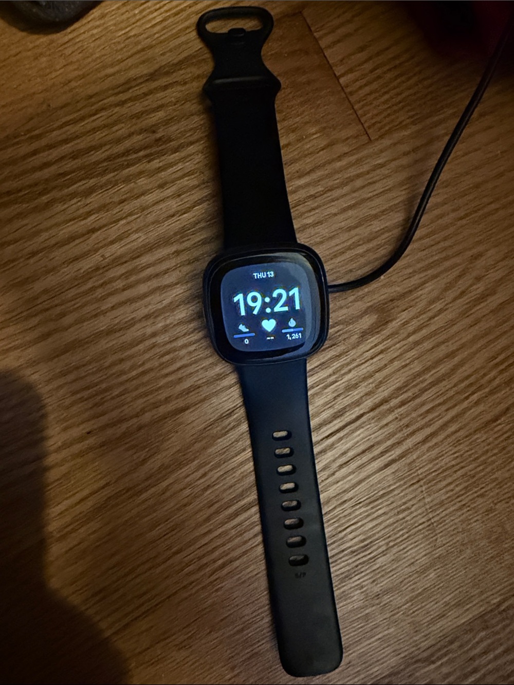 Black Fitbit versa 4 charger included